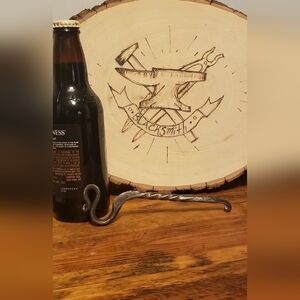 Hand forged bottle opener
